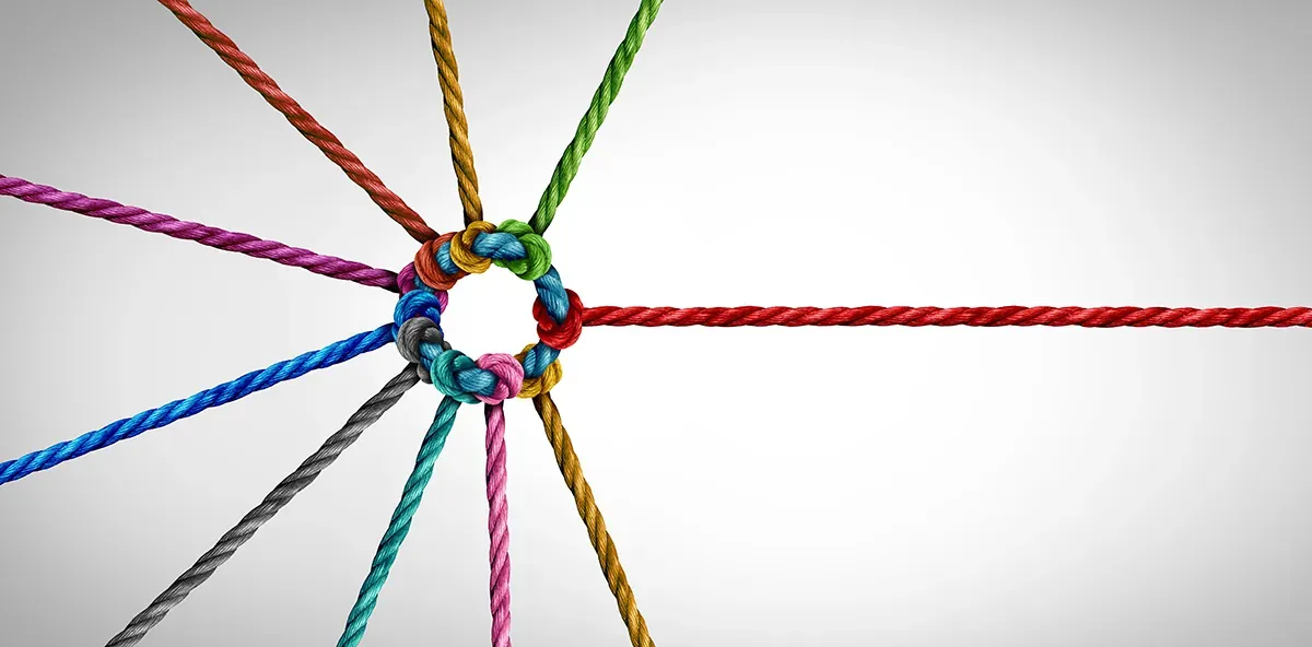 Coloured ropes tied together in a single knot